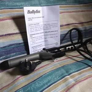 Curling tong (iron) with UK plug in.